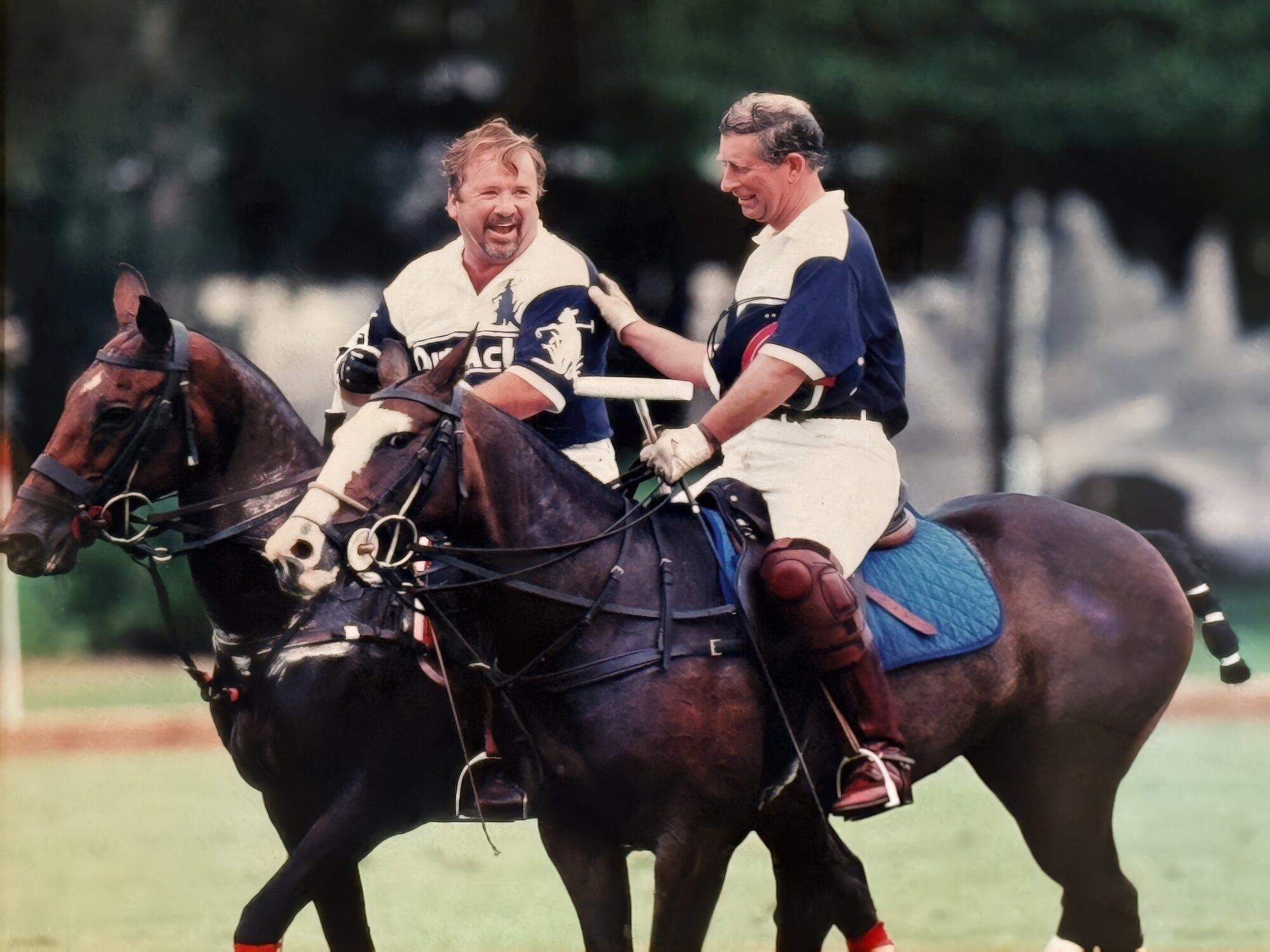 Tim Gannon with King Charles after a Royal County of Berkshire polo match